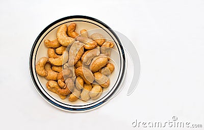 Bowl of Cashews on a White Background Stock Photo
