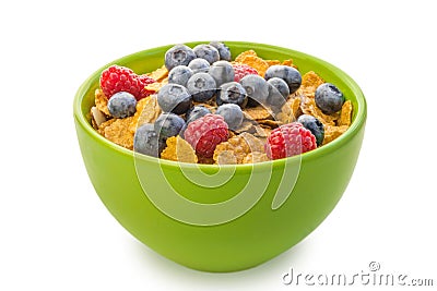 A bowl of cereal with raspberries and blueberries Stock Photo