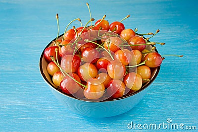 A bowl cherry. sweet cherries with a thin skin and thick creamy- Stock Photo
