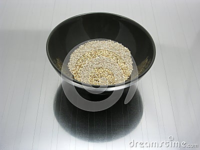 Bowl of chinaware with sesame Stock Photo