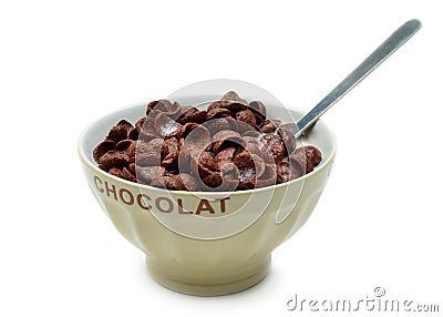 Bowl with chocolate cornflakes, cereals and milk Stock Photo