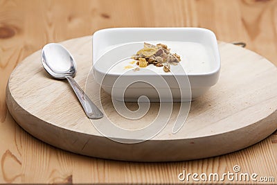 Bowl of conflakes and yogurt Stock Photo