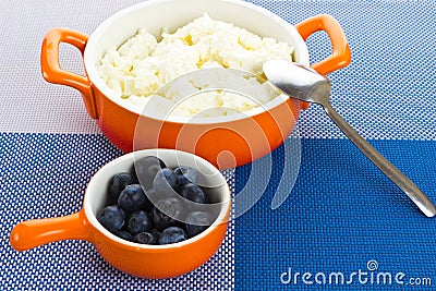 Bowl with cottage-cheese and berries Stock Photo