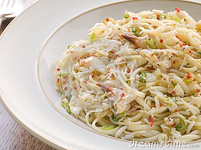 Bowl of Crab Linguini with Chilli and Coriander Stock Photo