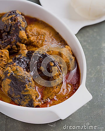 A bowl of delicious Palm Kernel Soup or Nigerian Banga Soup Stock Photo