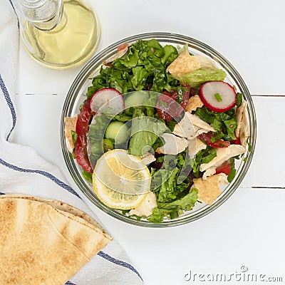 Bowl of Fattoush Lebanese Salad with pita bread Stock Photo