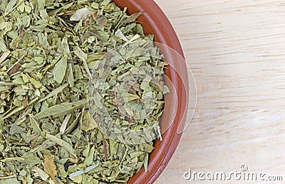 Bowl filled with cut and sifted senna leaf Stock Photo