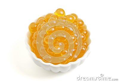 A Bowl Filled with Popping Boba on a White Background Stock Photo