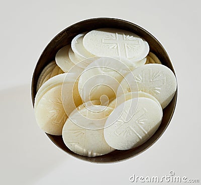 Bowl of consecrated Hosties for Holy Communion Stock Photo