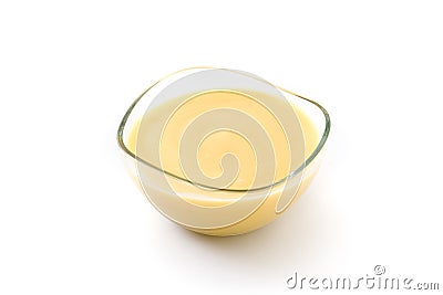 Bowl of homemade vanilla custard isolated Stock Photo