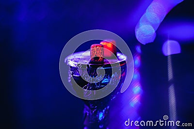 Bowl of the hookah with hot coals on the foil for Smoking and relaxing Stock Photo