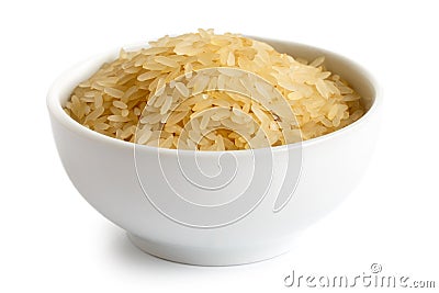 Bowl of long grain parboiled rice. Stock Photo