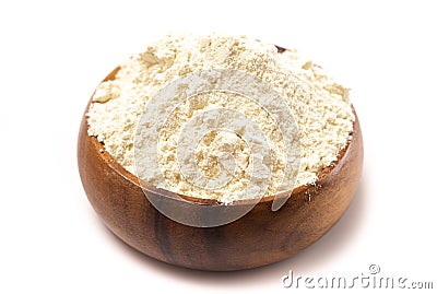 Bowl of Millet Flour in a Wood Bowl Isolated on a White Background Stock Photo