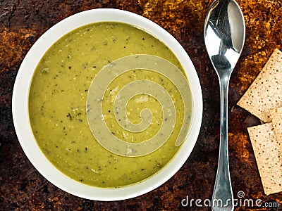 Bowl of Pea and Mint Soup Stock Photo