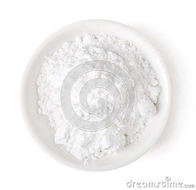 Bowl of powder sugar on white background, top view Stock Photo
