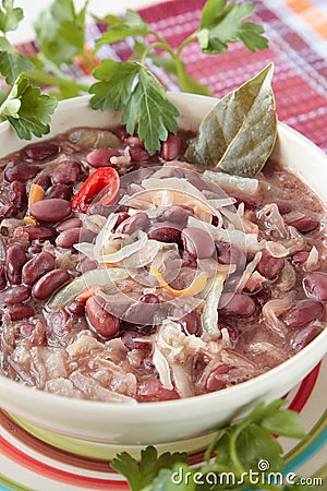 Bowl of red bean soup with sauerkraut, onions Stock Photo