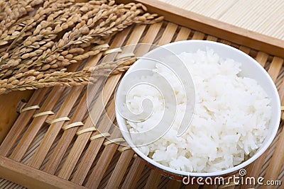 Bowl of rice and paddy Stock Photo