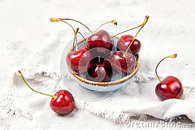 Bowl with ripe fresh red cherries on the table Stock Photo