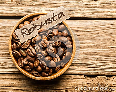 Bowl of Robusta coffee beans Stock Photo