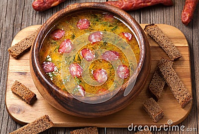 Bowl of rustic traditional chicken broth noodle Stock Photo