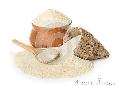 Bowl of semolina on white Stock Photo