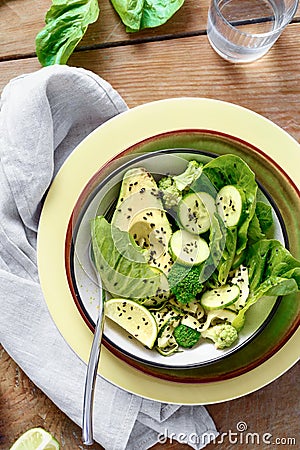 Bowl summer green salad Healthy food top view Stock Photo
