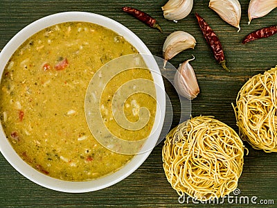 Bowl of Thai Green Chicken Curry Soup Stock Photo