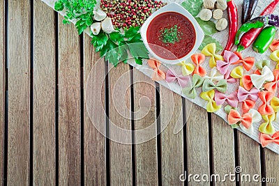 Tomato sauce in a bowl with pasta Stock Photo