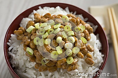 Bowl with traditional Japanese fermented soybeans called natto Stock Photo