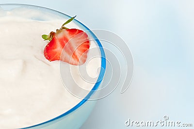 Bowl with whip cream and strawberry Stock Photo