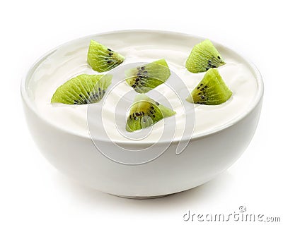 Bowl of yogurt with kiwi pieces Stock Photo