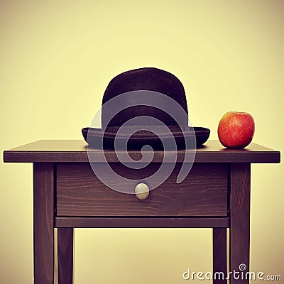 Bowler hat and apple, homage to Rene Magritte painting The Son o Stock Photo