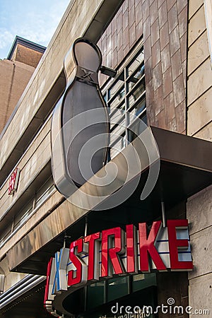 Bowling pin sign over the doorway entrance for the Lucky Strike Bowling Alley in center city, Philadelphia Editorial Stock Photo