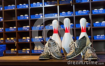 Bowling shoes and pins Stock Photo