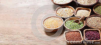 Bowls of legumes, lentils, chickpeas, beans, rice and cereals Stock Photo