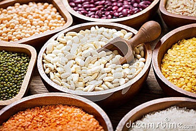 Bowls of legumes, lentils, chickpeas, rice and beans Stock Photo