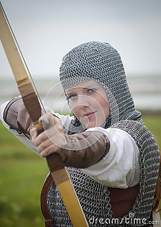 Bows woman / medieval armor Stock Photo