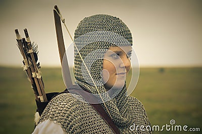 Bows woman / medieval armor / retro split toned Stock Photo