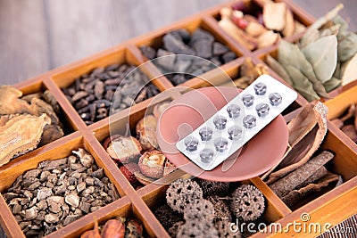 A box of all kinds of traditional Chinese medicine and Chinese medicine pills on the box Stock Photo