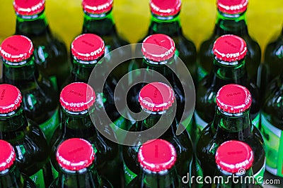 A box of bottles of soft drinks. a lot of closed bottles. picnic in nature. Stock Photo