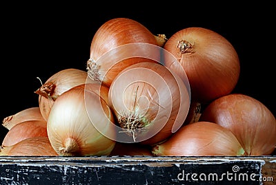 Box of Brown Onions Stock Photo