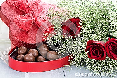 Box of Chocolates and Beauitful Roses Stock Photo