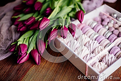 Zephyr, macaroons and tulips. Stock Photo