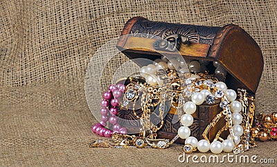 Box with jewelry on sacking Stock Photo