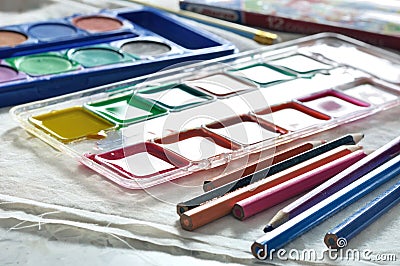 Box of mixed watercolors and watercolors pallet Stock Photo