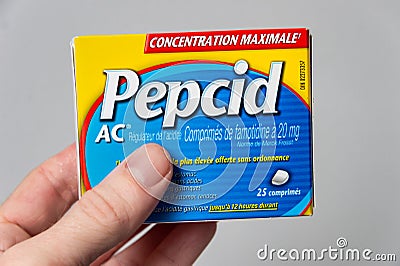 Box of Pepcid AC antacid over-the-counter medicine in french language Editorial Stock Photo