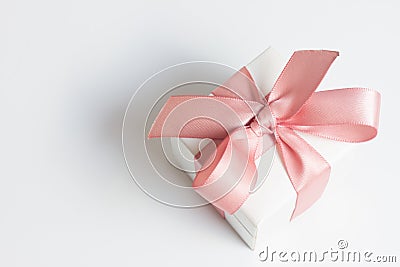 Box with pink ribbon Stock Photo