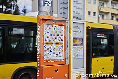 Box with a poster, on which you can stick chewing gum instead of throwing it on the floor. Editorial Stock Photo