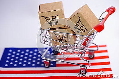 Box with shopping cart logo and America USA flag : Import Export Shopping online or eCommerce delivery service store product Stock Photo