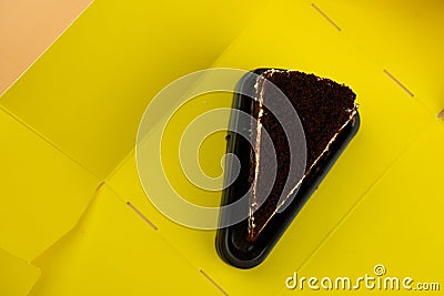 Box of slice of tasty cake layered with cream Stock Photo